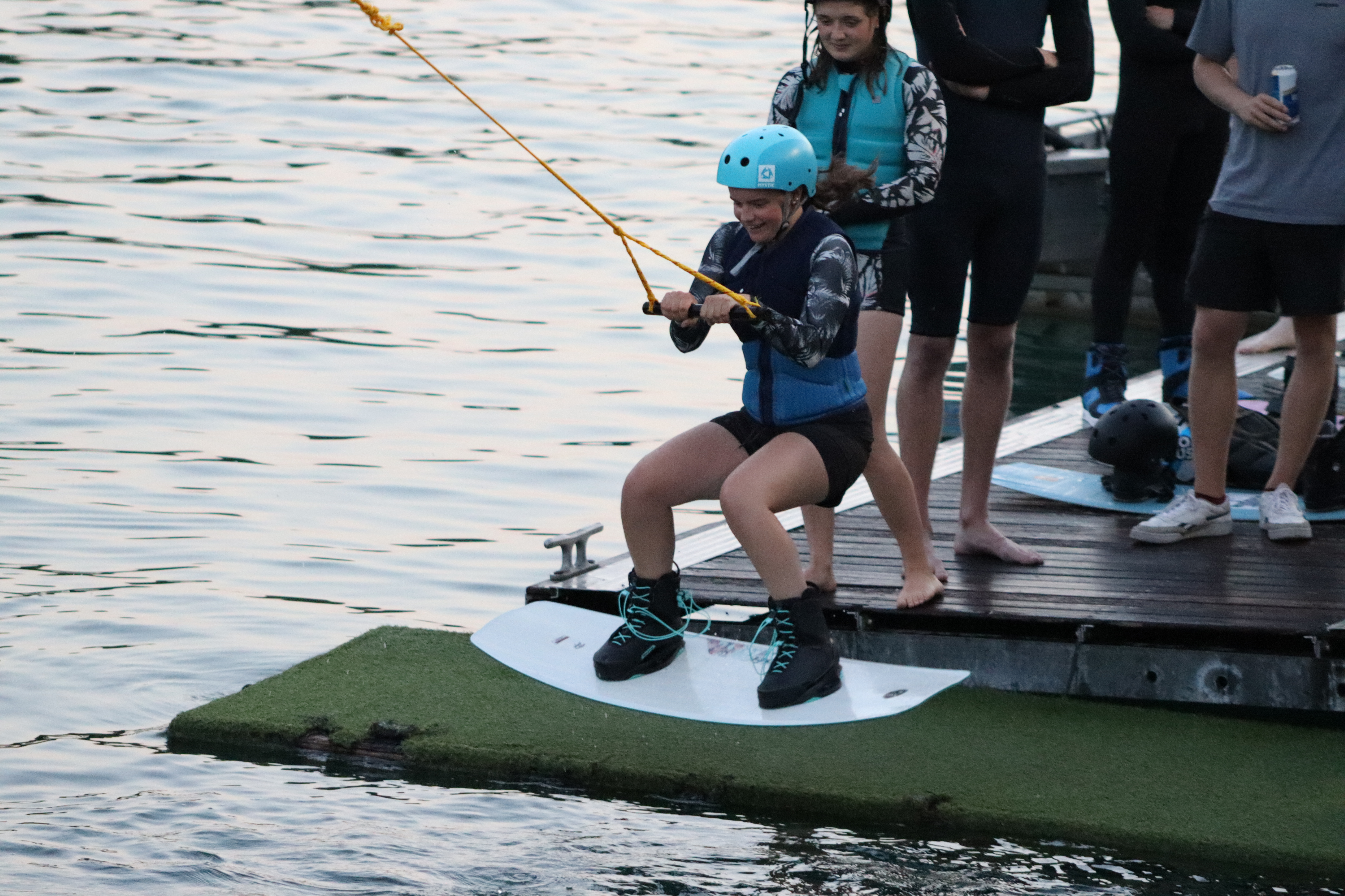 Women learning to wakeboard at Ballyhass